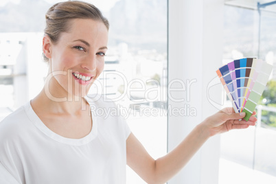 Portrait of a photo editor holding colors