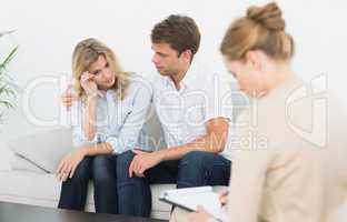 Couple in meeting with a financial adviser