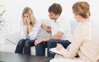 Couple in meeting with a financial adviser