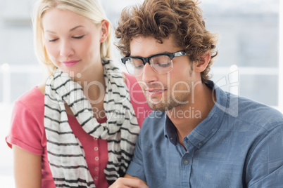 Young casual business couple