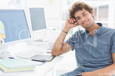 Smiling casual man in a bright office