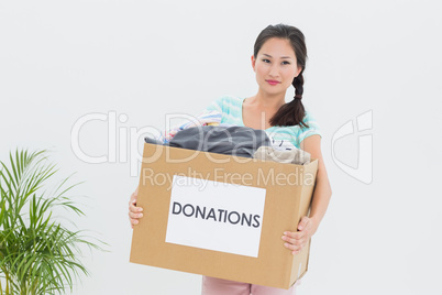 Woman with clothes donation