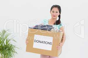 Woman with clothes donation