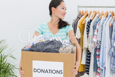 Woman with clothes donation