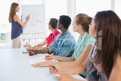 Casual business people in office at presentation