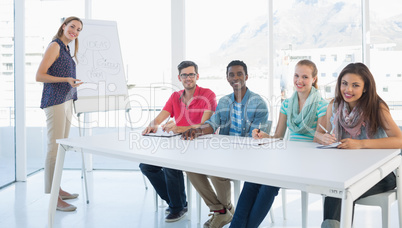 Casual business people in office at presentation Casual business people in office at presentation