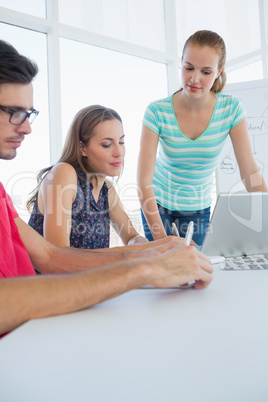 Casual business people in office at presentation