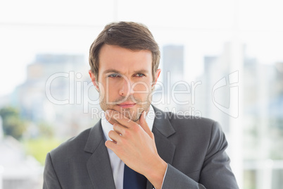 Close-up of a handsome young businessman outdoors