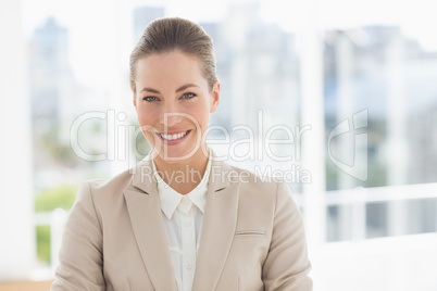 Close-up portrait of a young businesswoman smiling