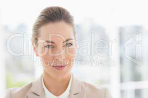 Close-up portrait of a young businesswoman smiling