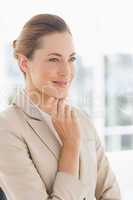 Close-up of a young businesswoman looking away