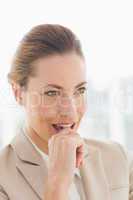 Close-up of a young businesswoman looking away