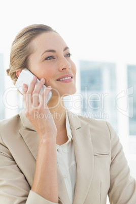 Beautiful businesswoman using mobile phone