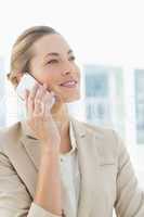 Beautiful businesswoman using mobile phone