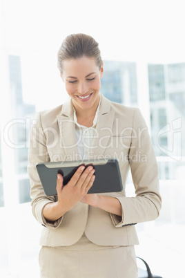 Beautiful businesswoman using digital tablet