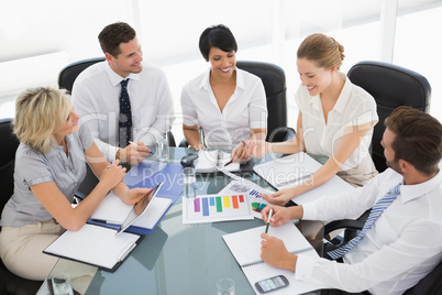 Young well dressed business people in meeting