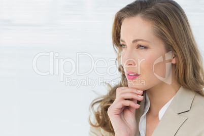 Close-up of a thoughtful businesswoman looking away