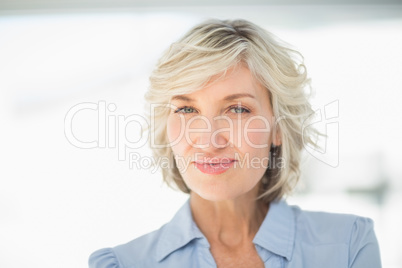 Close-up portrait of a smiling businesswoman