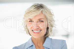 Close-up portrait of a smiling businesswoman