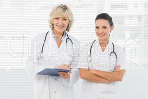 Portrait of two confident female doctors