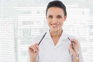 Beautiful confident female doctor with stethoscope