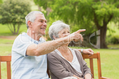 Side view of a senior couple at the park