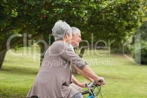 Senior couple on cycle ride in countryside