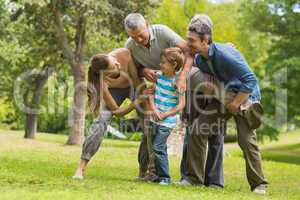 Family playing in park