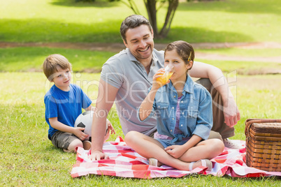 Father with kids in the park