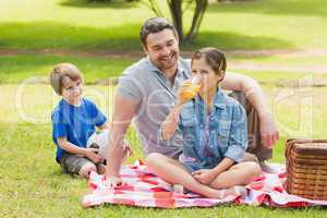 Father with kids in the park