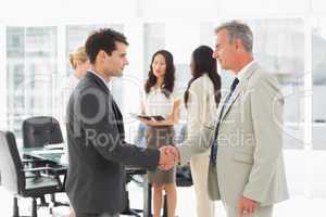 Businessmen meeting and shaking hands