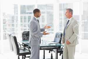 Businessmen speaking in the conference room