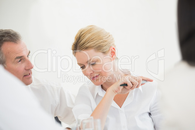 Happy businesswoman listening during a meeting Happy businesswoman listening during a meeting