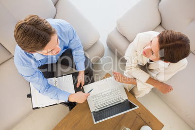 Business team working together on the couch