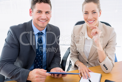 Smartly dressed colleagues in business meeting Smartly dressed colleagues in business meeting