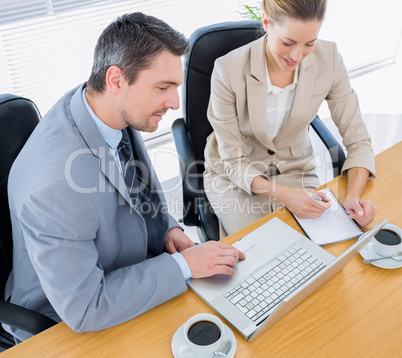 Smartly dressed colleagues in business meeting