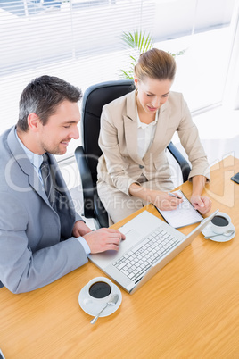 Smartly dressed colleagues in business meeting