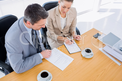 Smartly dressed colleagues in business meeting