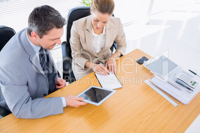 Smartly dressed colleagues in business meeting