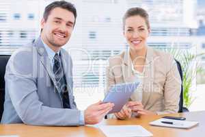 Smartly dressed colleagues in business meeting