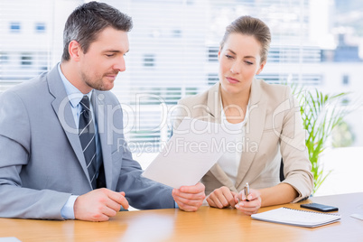 Smartly dressed colleagues in business meeting