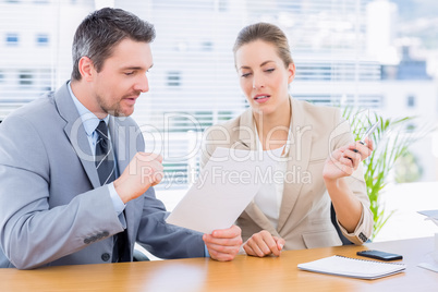 Smartly dressed colleagues in business meeting