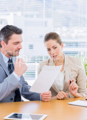 Smartly dressed colleagues in business meeting