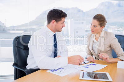 Smartly dressed colleagues in business meeting