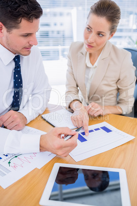 Smartly dressed colleagues in business meeting