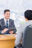 Recruiter checking the candidate during a job interview
