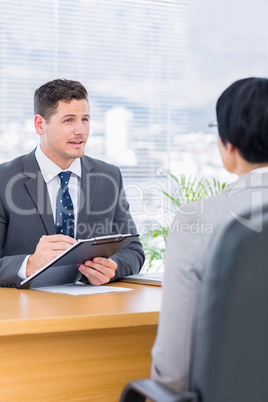 Recruiter checking the candidate during a job interview