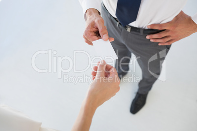 Executives exchanging business card