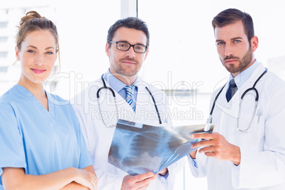 Portrait of doctors with x-ray report