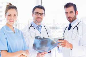 Portrait of doctors with x-ray report